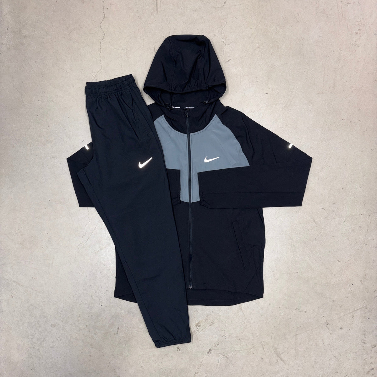 Nike Black/Smoke Grey Repel Miler Jacket x Black Woven Challenger Pants Tracksuit